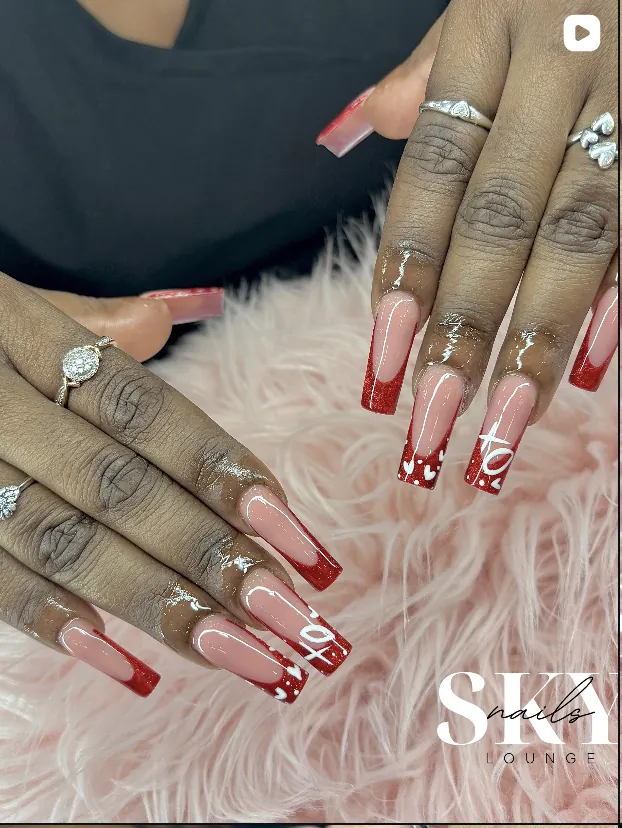 Red XO french tip coffin nails