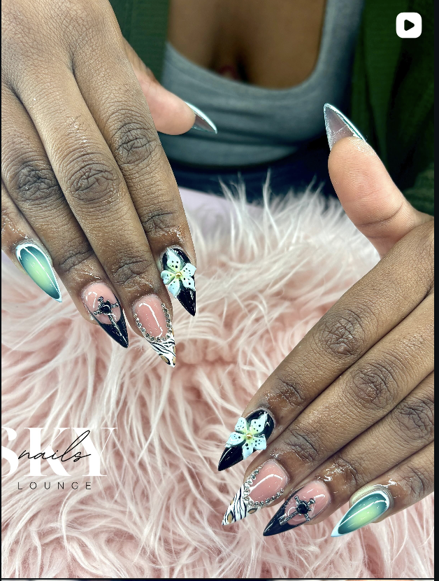 Stiletto nails with flower art